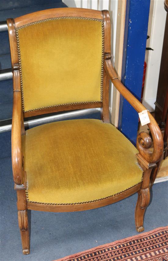 A French Empire mahogany scroll arm fauteuil